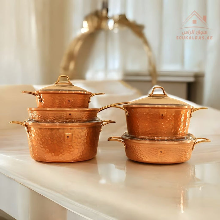 طقم قدور كوبر فاخر 9 قطع  بطبقة جرانيت ألماني غير لاصقة مع سطح خارجي بنقشة بلون النحاس الفاخر ,مناسب لجميع أنواع المواقد