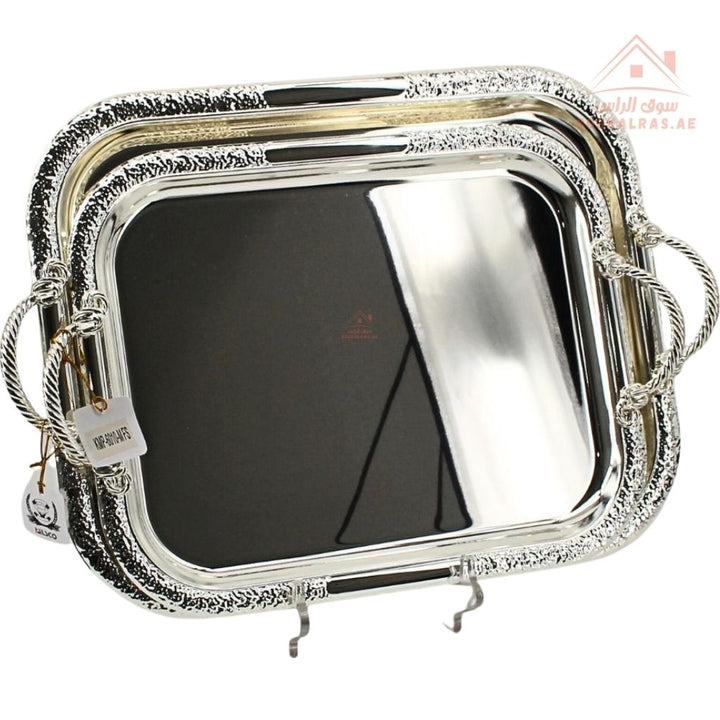 صينية تقديم ستانلس ستيل باللون الفضى– حافة محفورة ومقابض مزخرفة| متوفرة بمقاسين|  مثالية لتقديم الشاي والقهوة والحلويات في الضيافة اليومية 