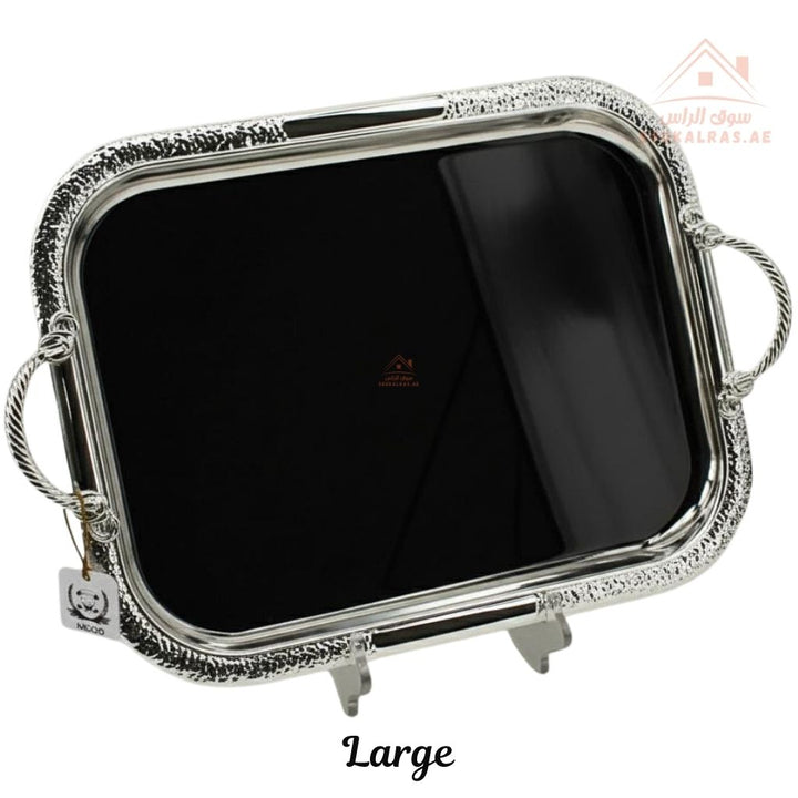 صينية تقديم ستانلس ستيل باللون الفضى– حافة محفورة ومقابض مزخرفة| متوفرة بمقاسين|  مثالية لتقديم الشاي والقهوة والحلويات في الضيافة اليومية 