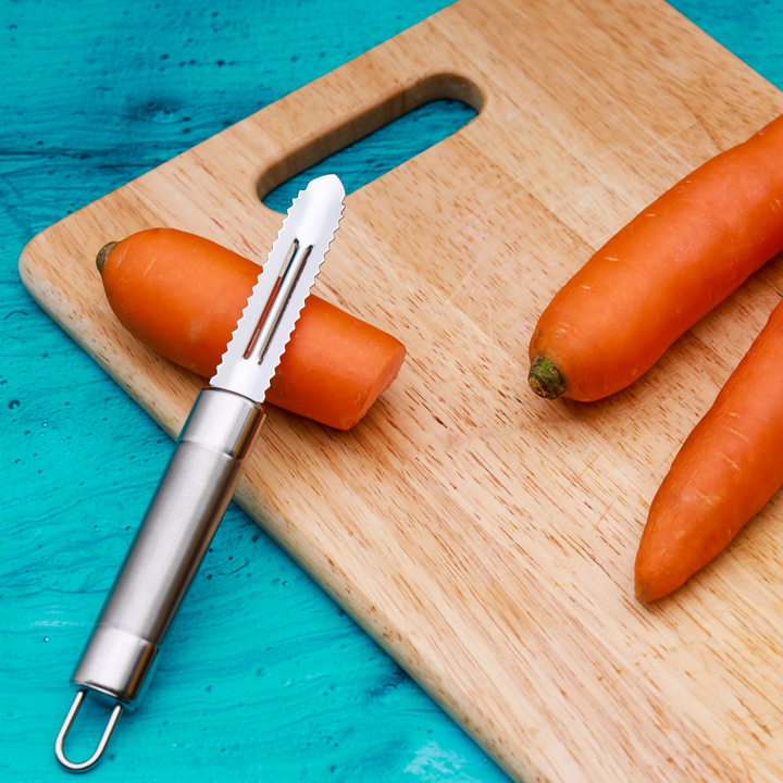 Professional Stainless-Steel Peeler with Serrated Edges and Ergonomic Handle