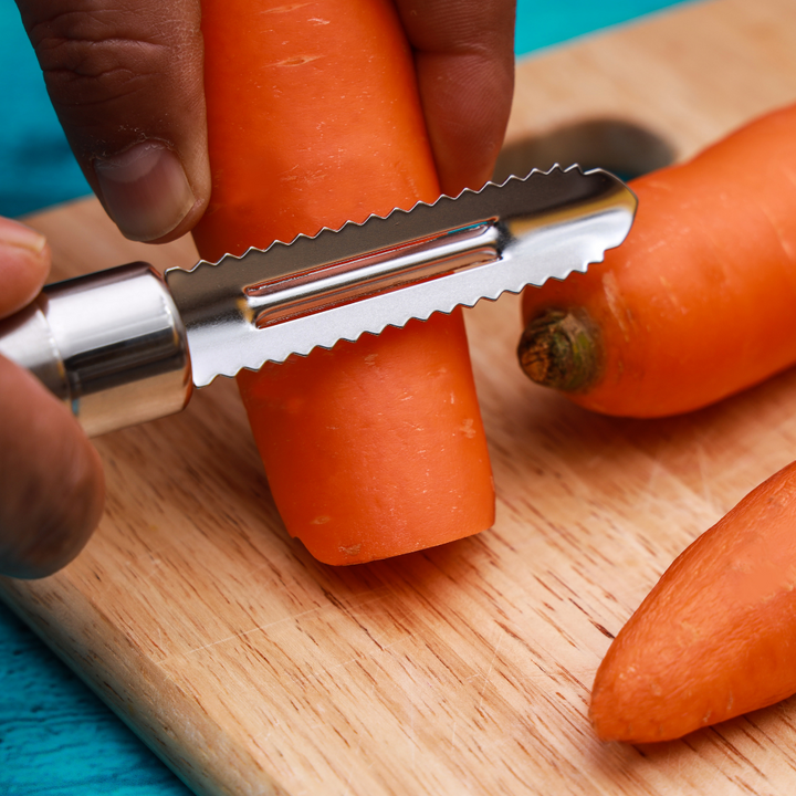 Professional Stainless-Steel Peeler with Serrated Edges and Ergonomic Handle