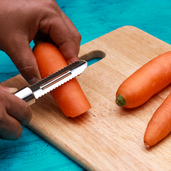 Professional Stainless-Steel Peeler with Serrated Edges and Ergonomic Handle