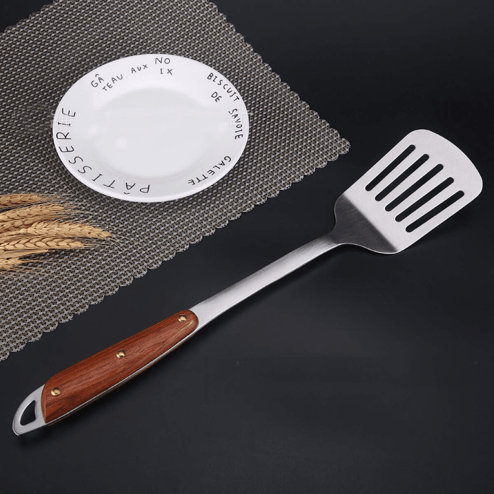 Highly Durable Stainless Steel Slotted Turner with Long Handle|high - quality. - Souk Al RasSpatulas Whisks & Turning Spoons