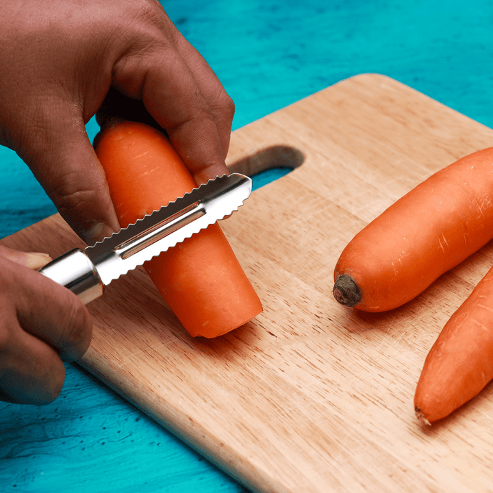 Professional Stainless - Steel Peeler with Serrated Edges and Ergonomic Handle - Souk Al RasKitchen Accessories