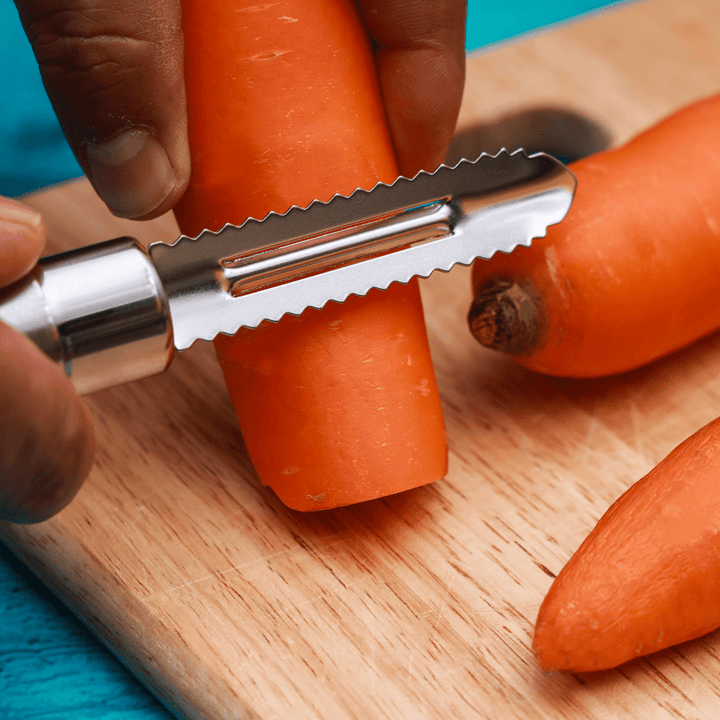 Professional Stainless - Steel Peeler with Serrated Edges and Ergonomic Handle - Souk Al RasKitchen Accessories