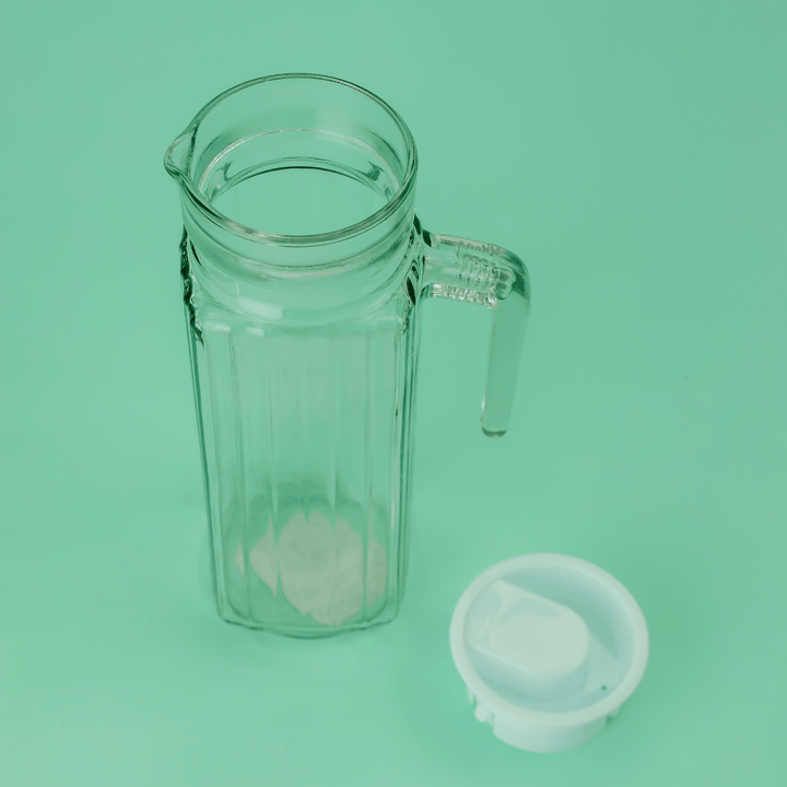 Glass Pitcher with Plastic Lid, Capacity 1000ml - Souk Al RasDrinkware