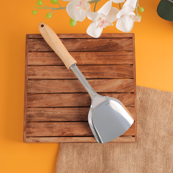 High - Quality Stainless Steel Solid Turner with Wooden Handle - Souk Al RasCooking Utensils